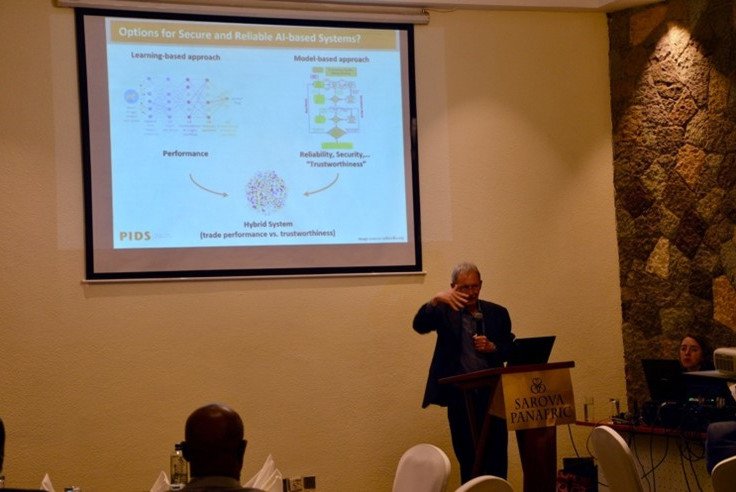 Prof. Posegga giving a talk on Security of AI Systems at a DAAD Event in Nairobi (2023)