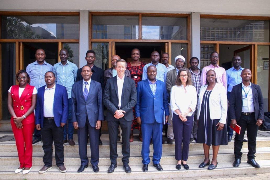 Prof. Annette Hautli-Janisz and Prof. Dr. Gordon Fraser with Prof. Salesio Kiura and staff and students at The Technical University of Kenya, Feburary 2026.